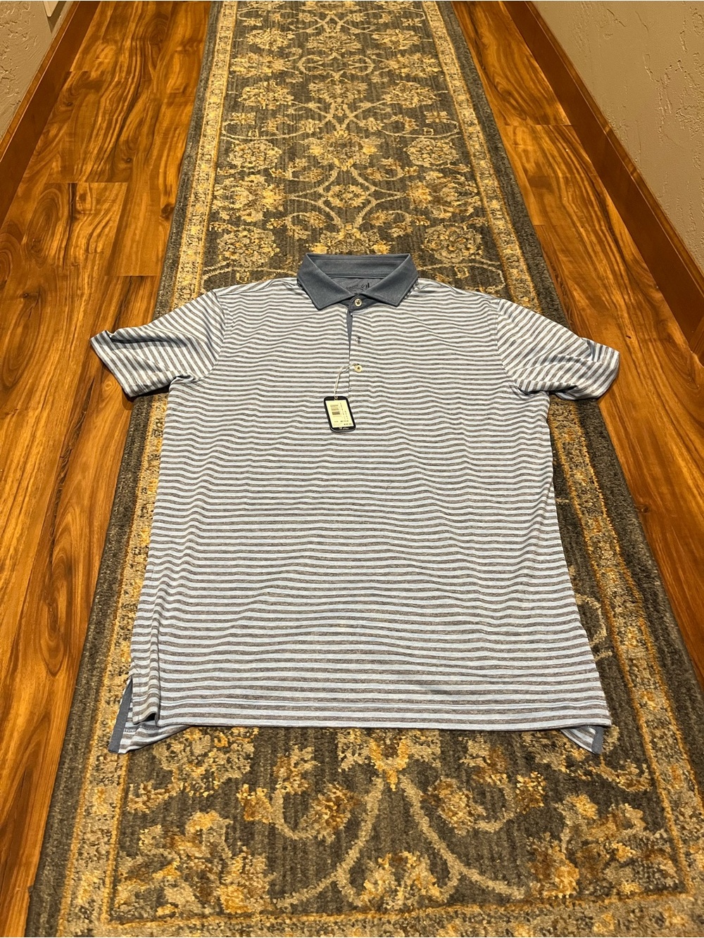 Johnnie-O blue striped performance golf polo